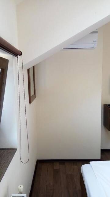 Фото номера Двухместный номер в мансарде с 2 отдельными кроватями Гостевой дом Vila Alma г. Бэйле-Феликс 3