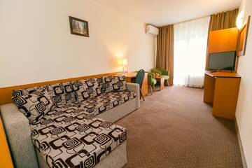 Фото номера Люкс с 1 спальней Отель Hotel Poienița г. Бэйле-Феликс 4