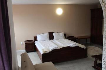 Фото номера Семейный люкс Гостевой дом Pensiunea Pepper House г. Бэйле-Феликс 6