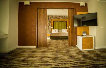 Фото номера Люкс Отель Hotel President SPA г. Бэйле-Феликс 5